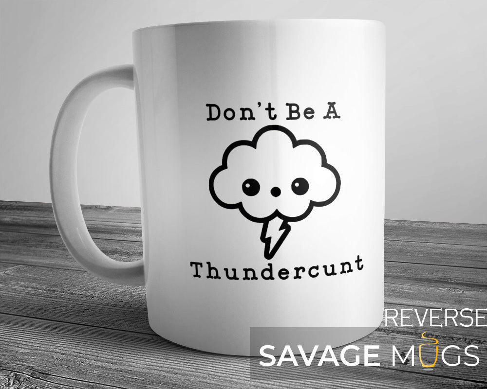 White ceramic mug with cartoon cloud lightning bolt and funny sarcastic quote