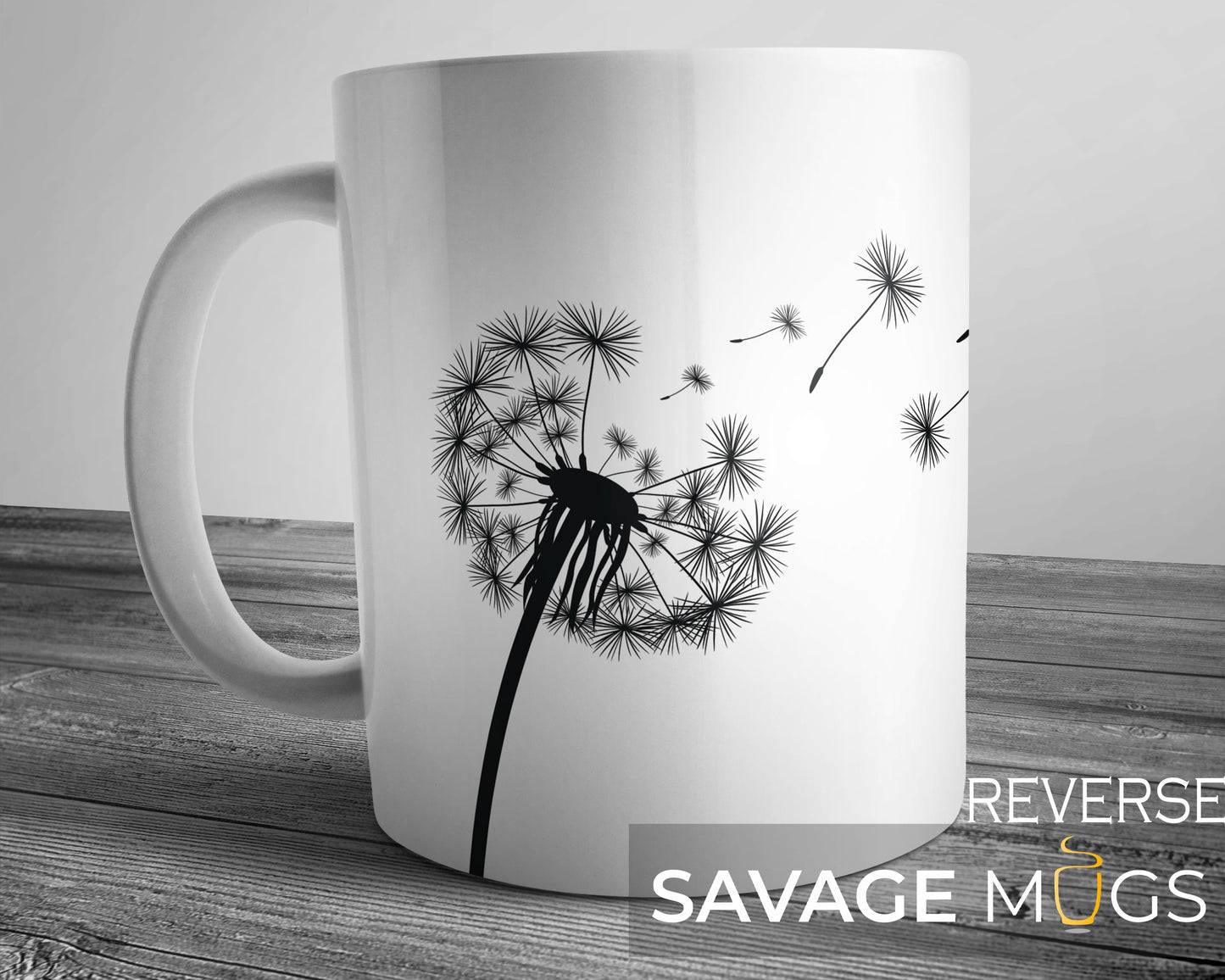 White ceramic mug with minimalist dandelion design and drifting seeds