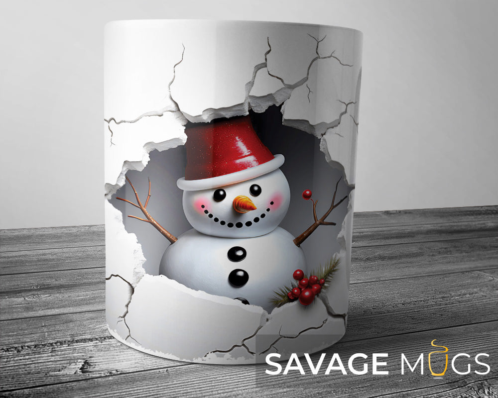White ceramic mug with 3D illusion snowman breaking through cracked snowy wall Christmas design
