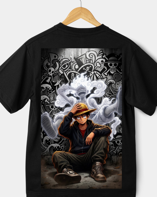 Black boxy anime t-shirt featuring pirate character sitting confidently with detailed background graphic design