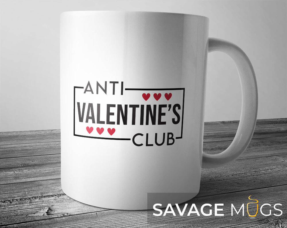 White ceramic mug with Anti Valentine’s Club text and heart design
