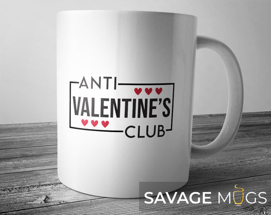 White ceramic mug with Anti Valentine’s Club text and heart design
