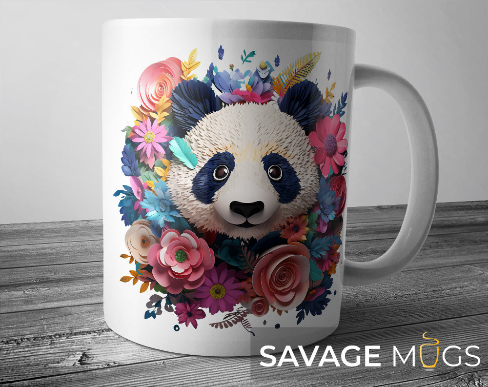 White ceramic mug with colourful artistic panda surrounded by vibrant floral paper art design