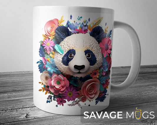 White ceramic mug with colourful artistic panda surrounded by vibrant floral paper art design