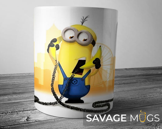 White ceramic mug with banana cartoon inspired character holding a telephone