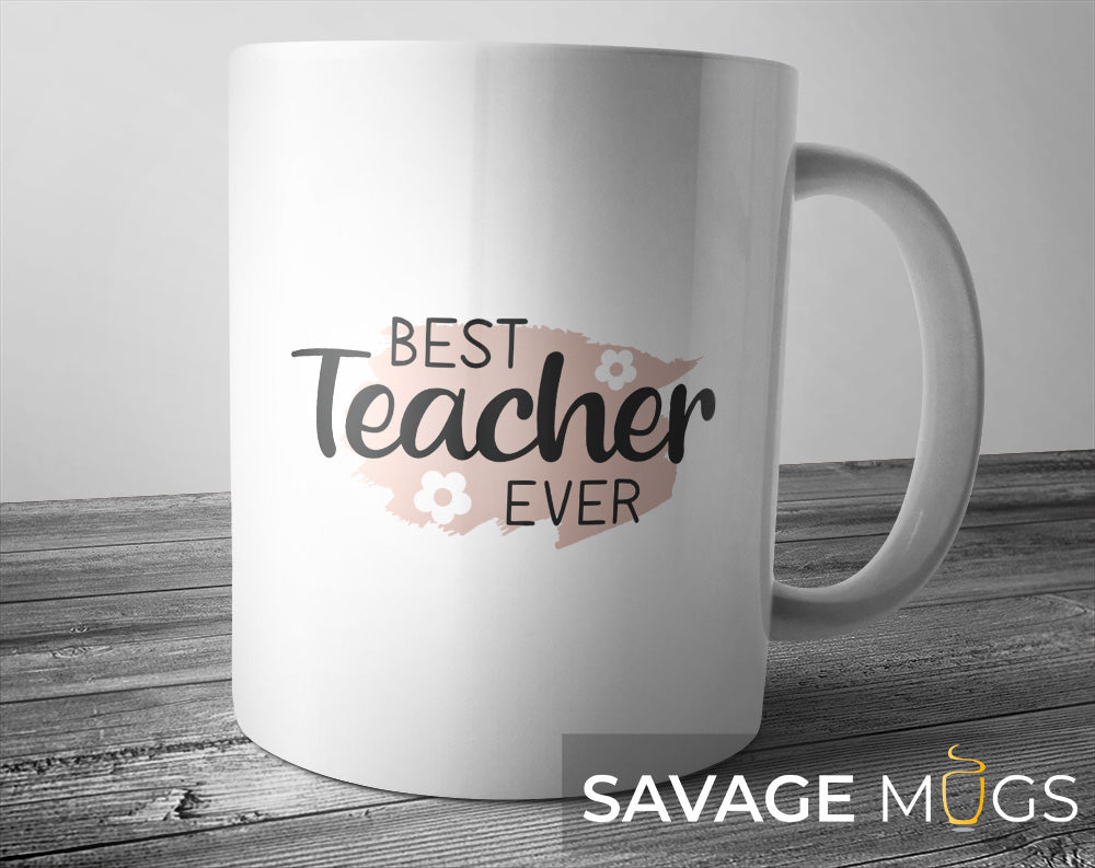 White ceramic mug with Best Teacher Ever appreciation design with floral accents
