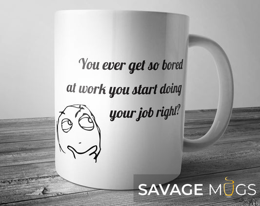 White ceramic mug with funny bored at work you start doing your job quote