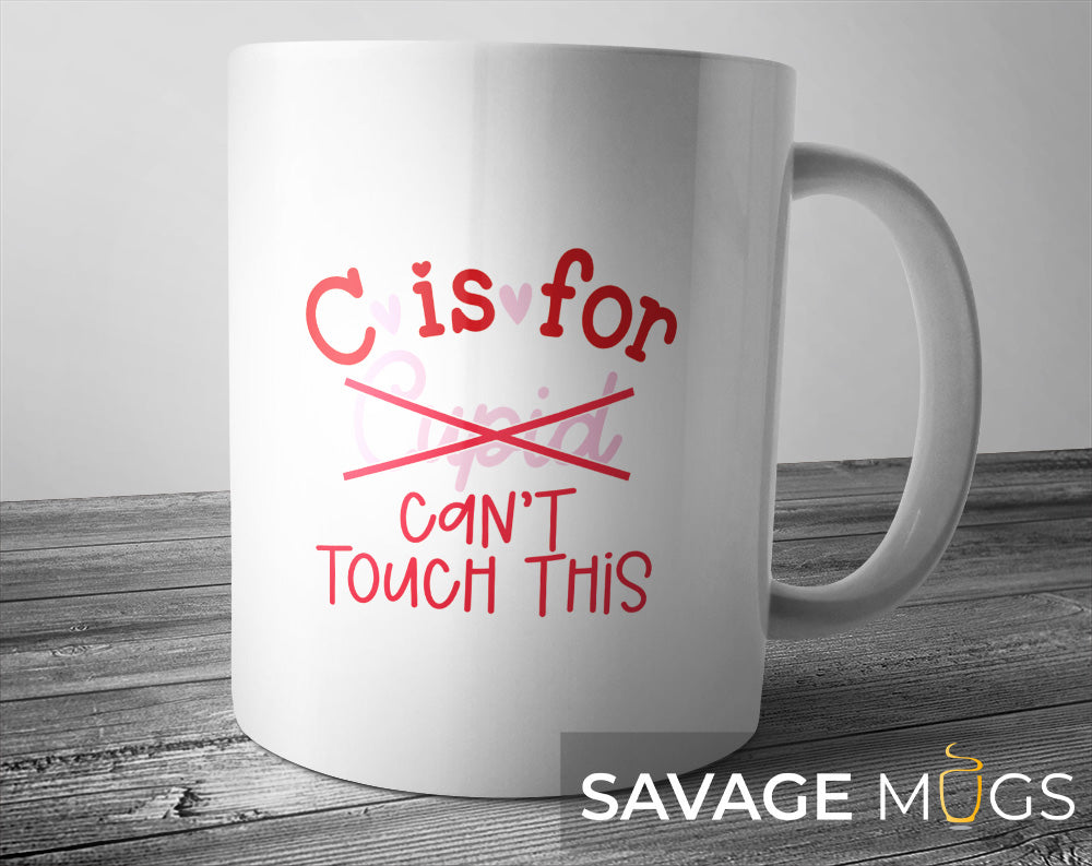 White ceramic mug with C Is For Can’t Touch This funny Valentine design