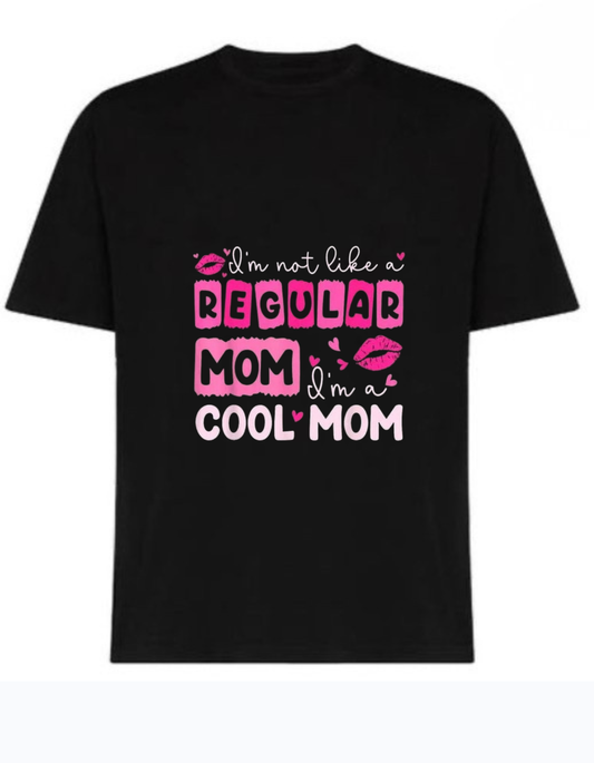 Black 220 GSM cotton t-shirt with “I’m Not a Regular Mom I’m a Cool Mom” pink and white quote design
