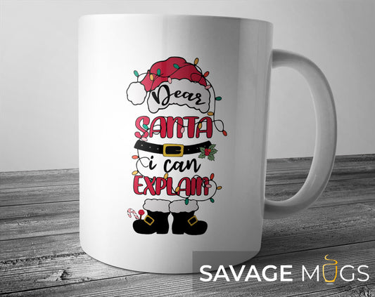 White ceramic Christmas mug with Dear Santa I Can Explain holiday design