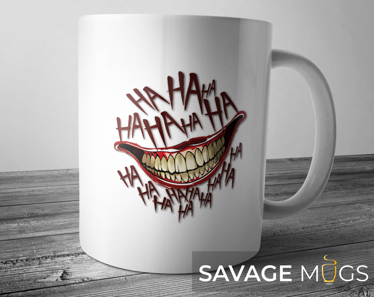 White ceramic mug with sinister grin illustration surrounded by HA HA lettering