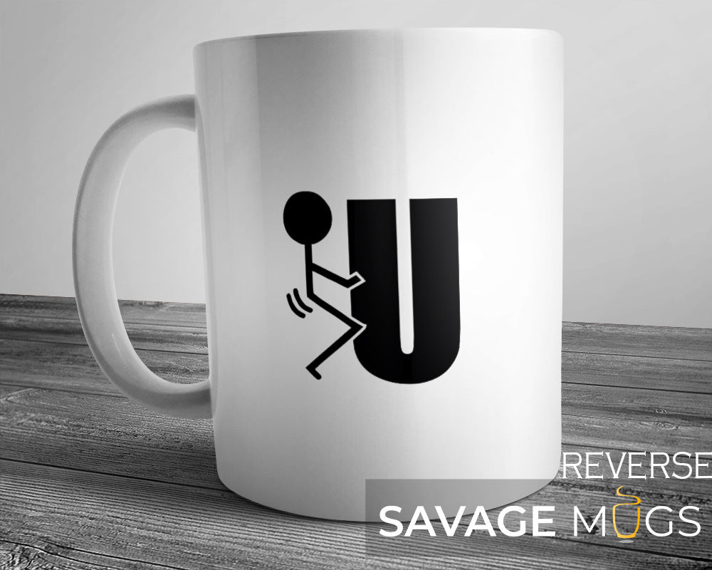 White ceramic mug with minimalist stickman graphic interacting with the letter U in a funny sarcastic design