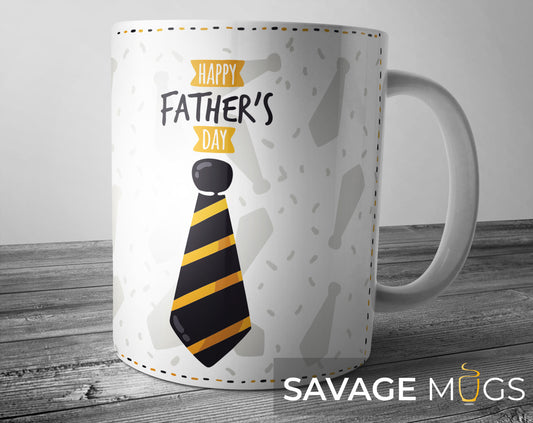 White ceramic mug with Happy Fathers Day message and black and gold tie design