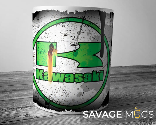 White ceramic mug featuring Kawasaki logo with vintage grunge motorcycle design
