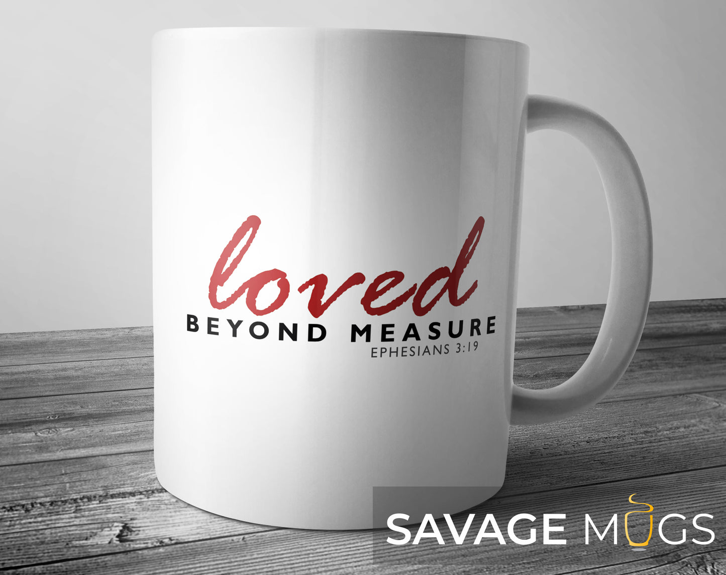 White ceramic mug with Christian message Loved Beyond Measure Ephesians 3:19