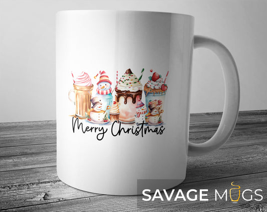 White ceramic mug with Merry Christmas text and snowman milkshake holiday illustration