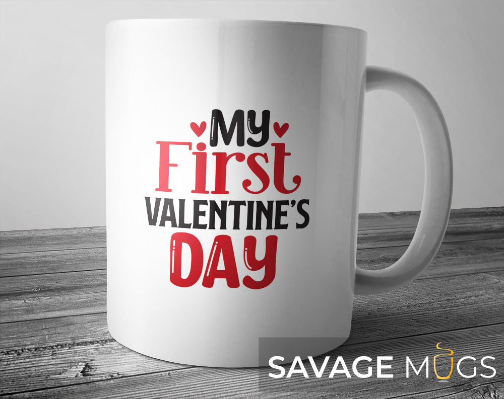 White mug with My First Valentine’s Day text and heart design