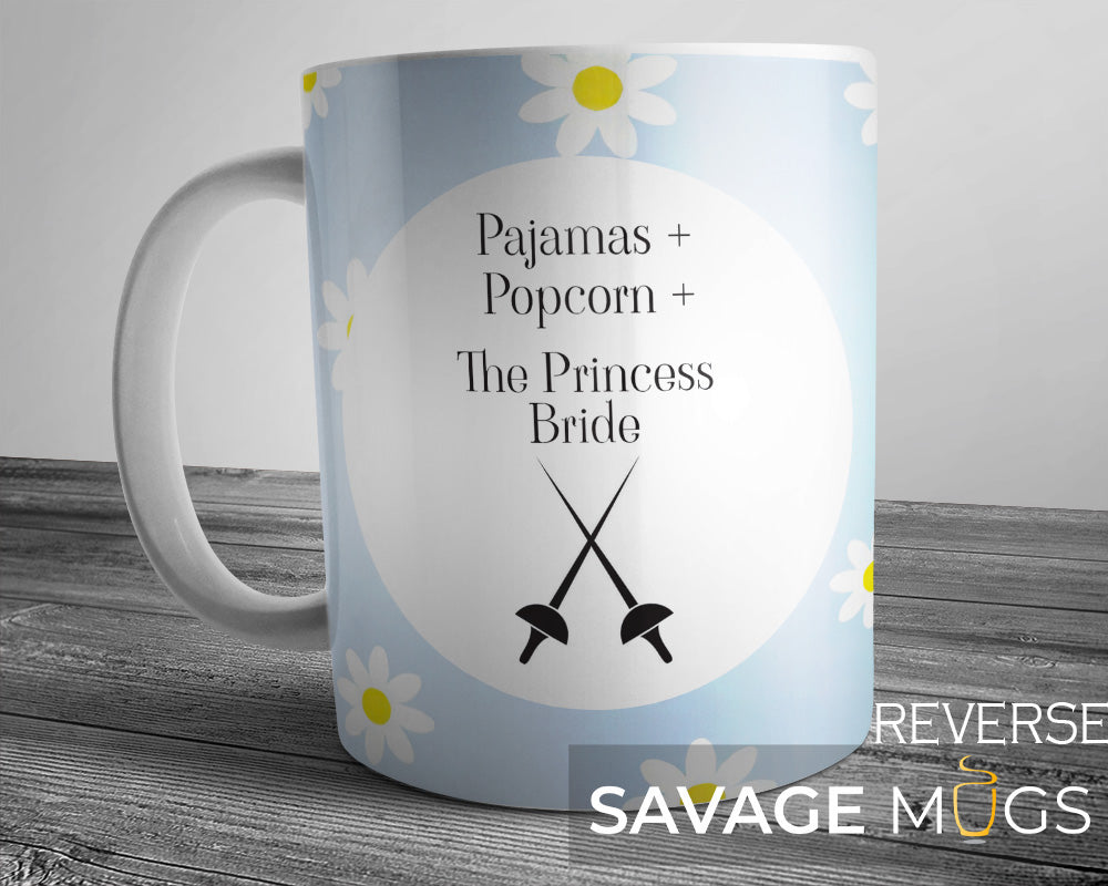 White ceramic mug with Pajamas Popcorn The Princess Bride movie night design