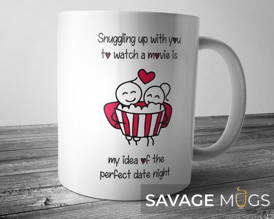 White ceramic mug with couple illustration enjoying movie night and popcorn