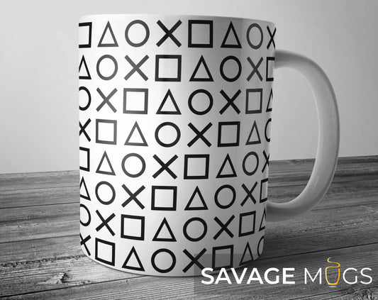 White ceramic mug with PlayStation controller symbols pattern design