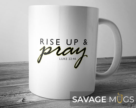 White ceramic mug featuring Christian message Rise Up and Pray Luke 22:46