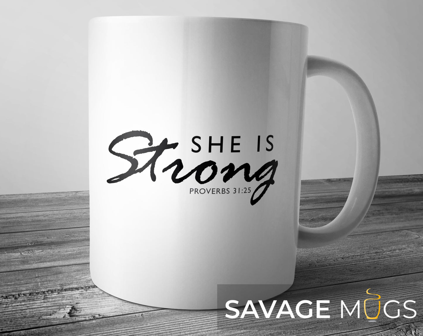 White ceramic mug featuring Christian message She Is Strong Proverbs 31:25