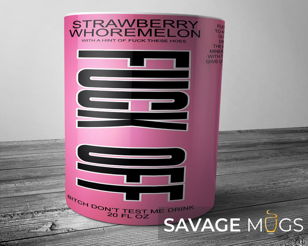 White ceramic mug with pink parody drink label design reading Strawberry Whoremelon with humorous beverage-style graphics